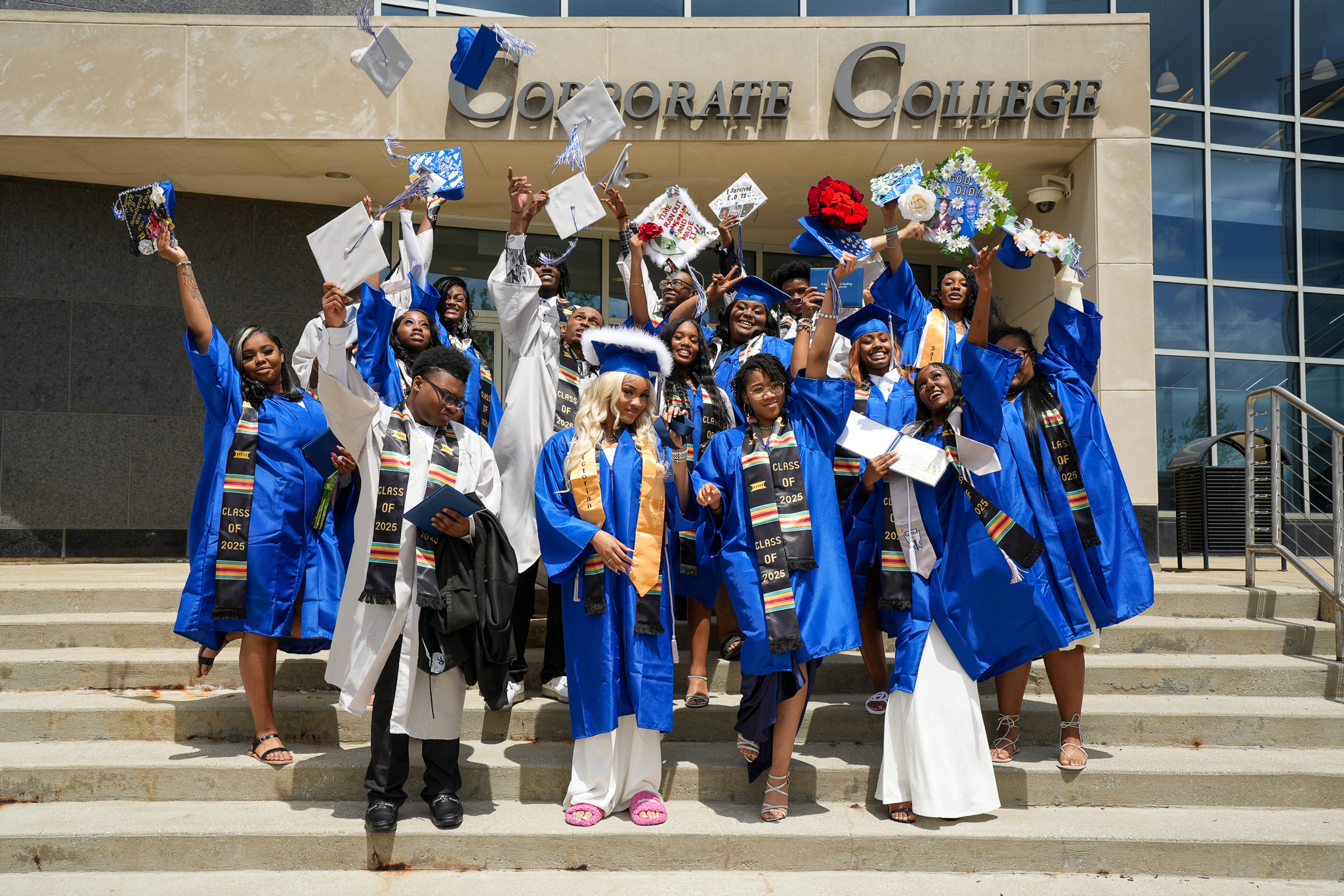 Graduates throwing caps